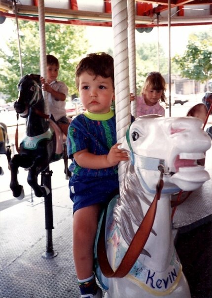 Kevin as a child at Memphis Kiddie Park in Brooklyn, Ohio