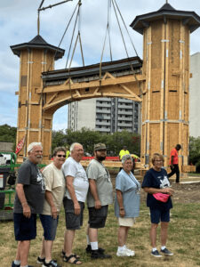 A group of Euclid Beach Park Now board members who were in attendance posed for a group photo after the arch was successfully placed onto its new foundation! (Photo by Stuart O. Smith, Jr.)