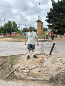 The arch's old foundation made for a perfect photo opportunity, with the arch itself standing in its new position behind me.