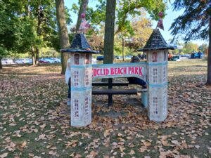 Local artist Joan of Art displayed her model of the Euclid Beach Park Arch, which she first set up at the watch party for the Arch's relocation earlier this summer. (Photo by Julie Smith)