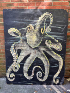 This giant octopus painting is an original decorative element from the Laff-In-The-Dark ride at Euclid Beach Park! It measures a massive 4 feet by 5 feet, making it one of the largest pieces in my collection!